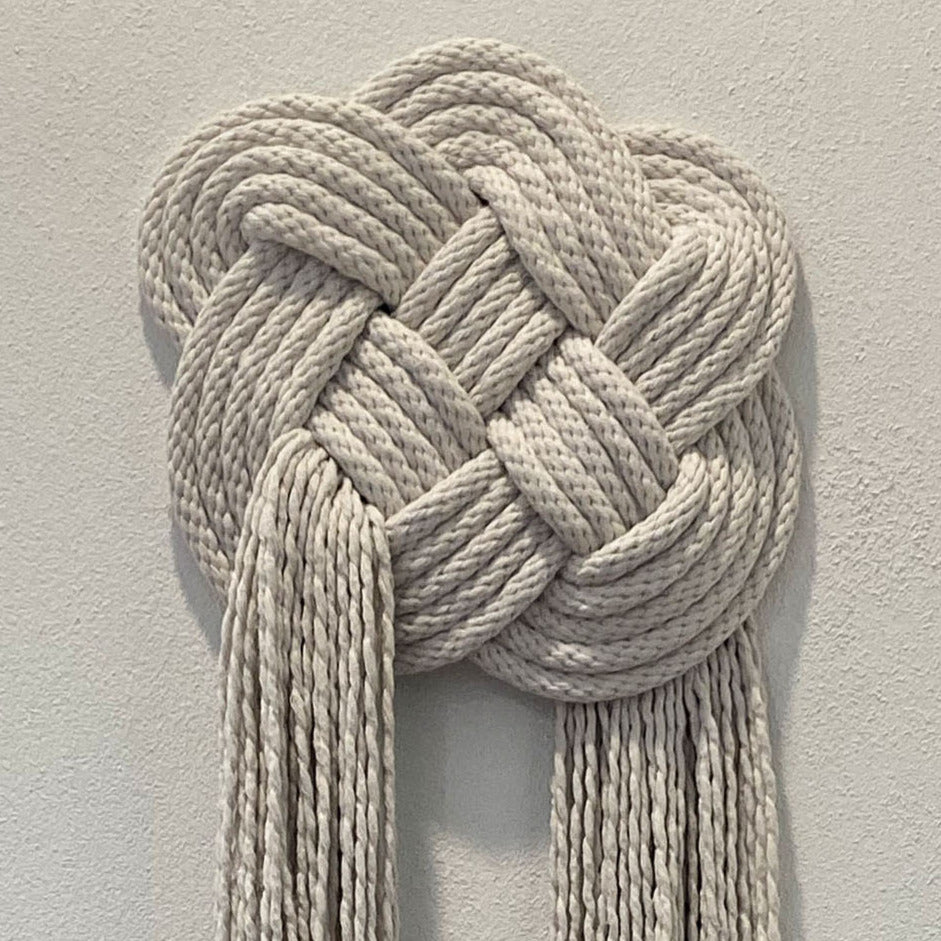 Knotted heart wall hanging