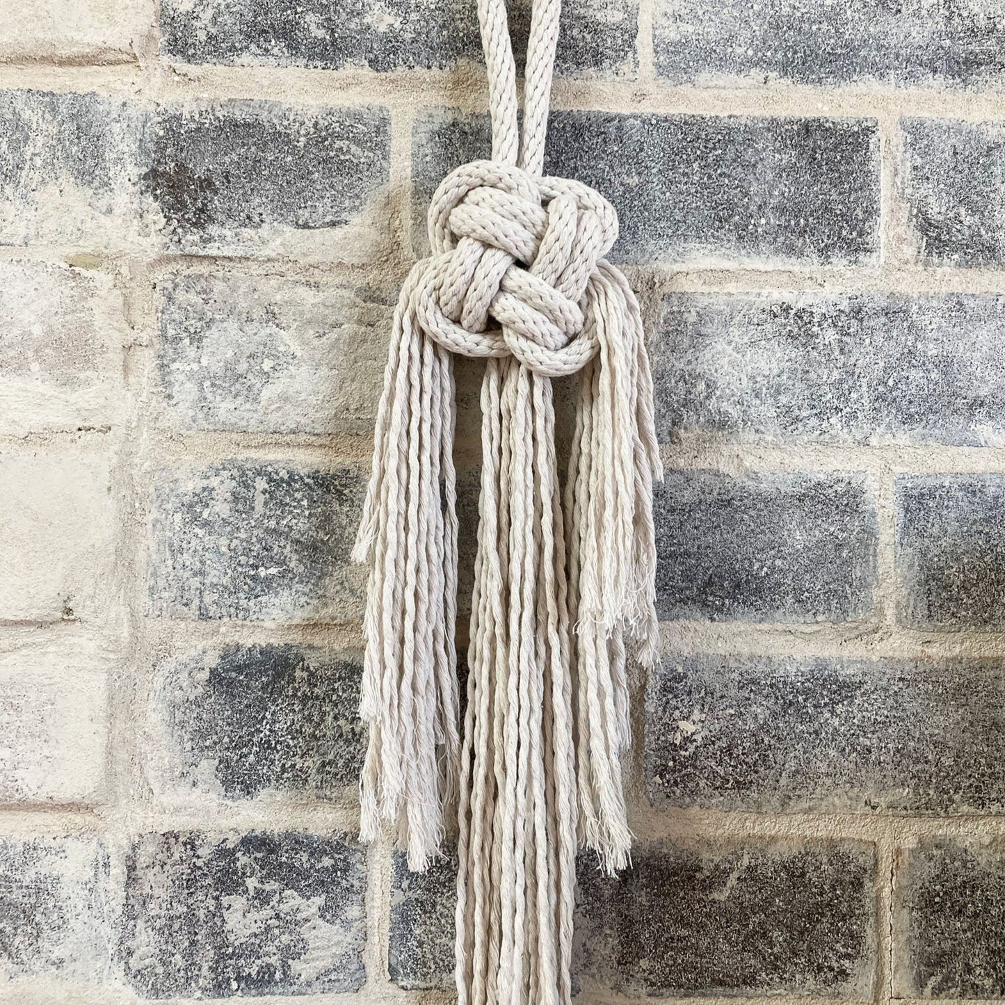 Good luck knotted wall hanging