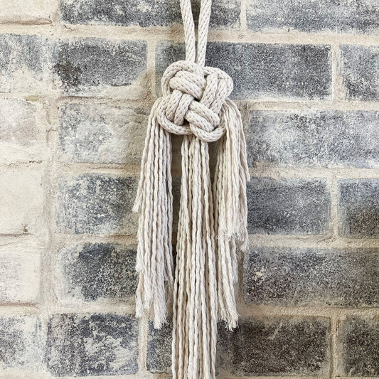 Good luck knotted wall hanging