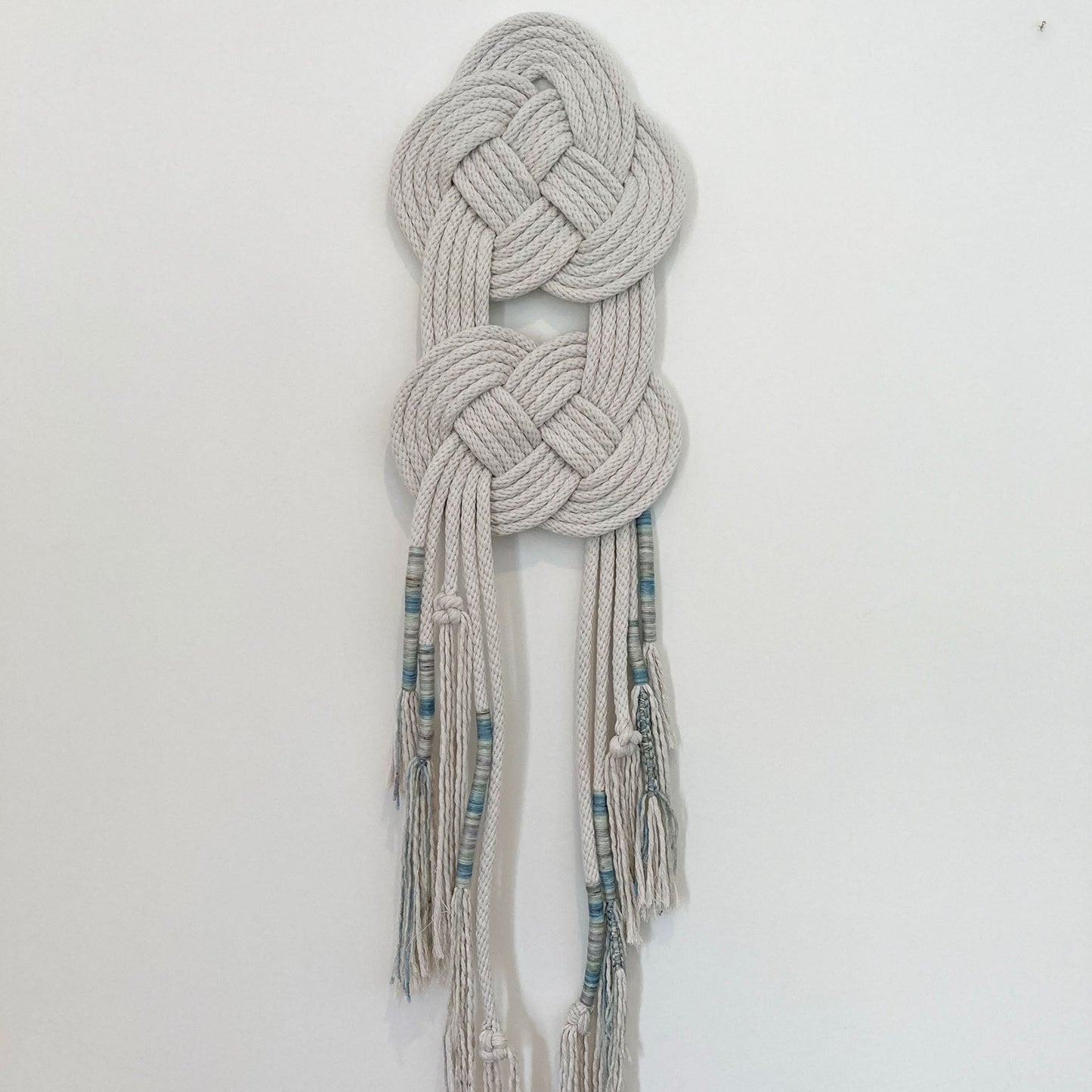 Double Coin knotted wall hanging