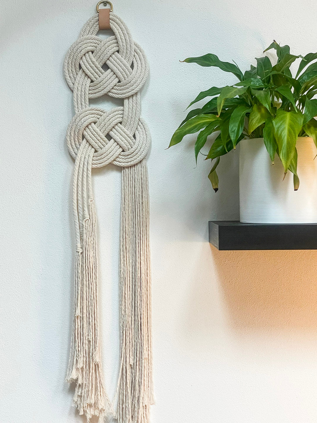 Double Coin knotted wall hanging