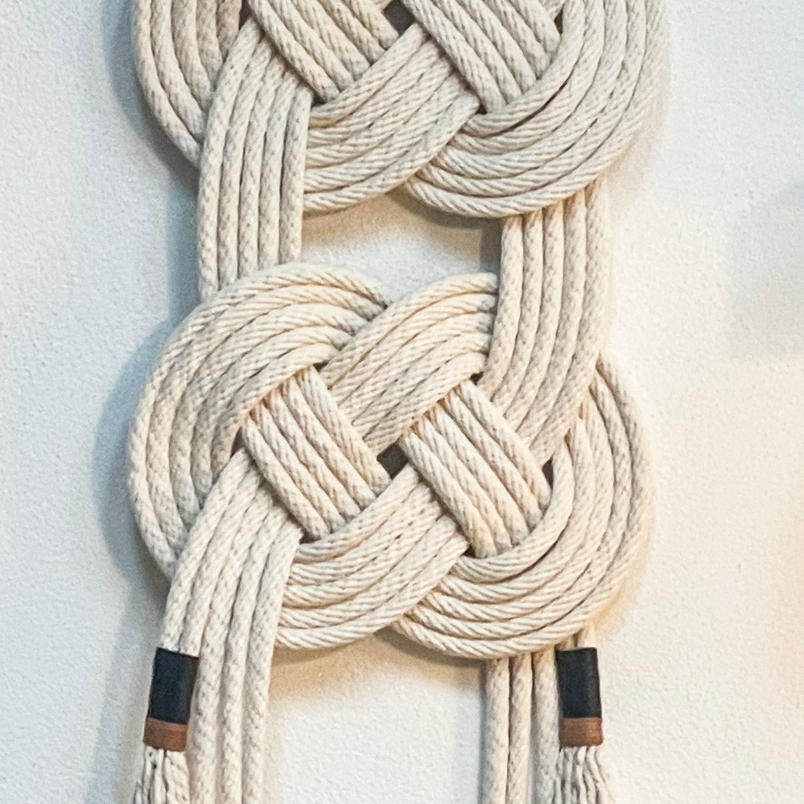 Double Coin knotted wall hanging