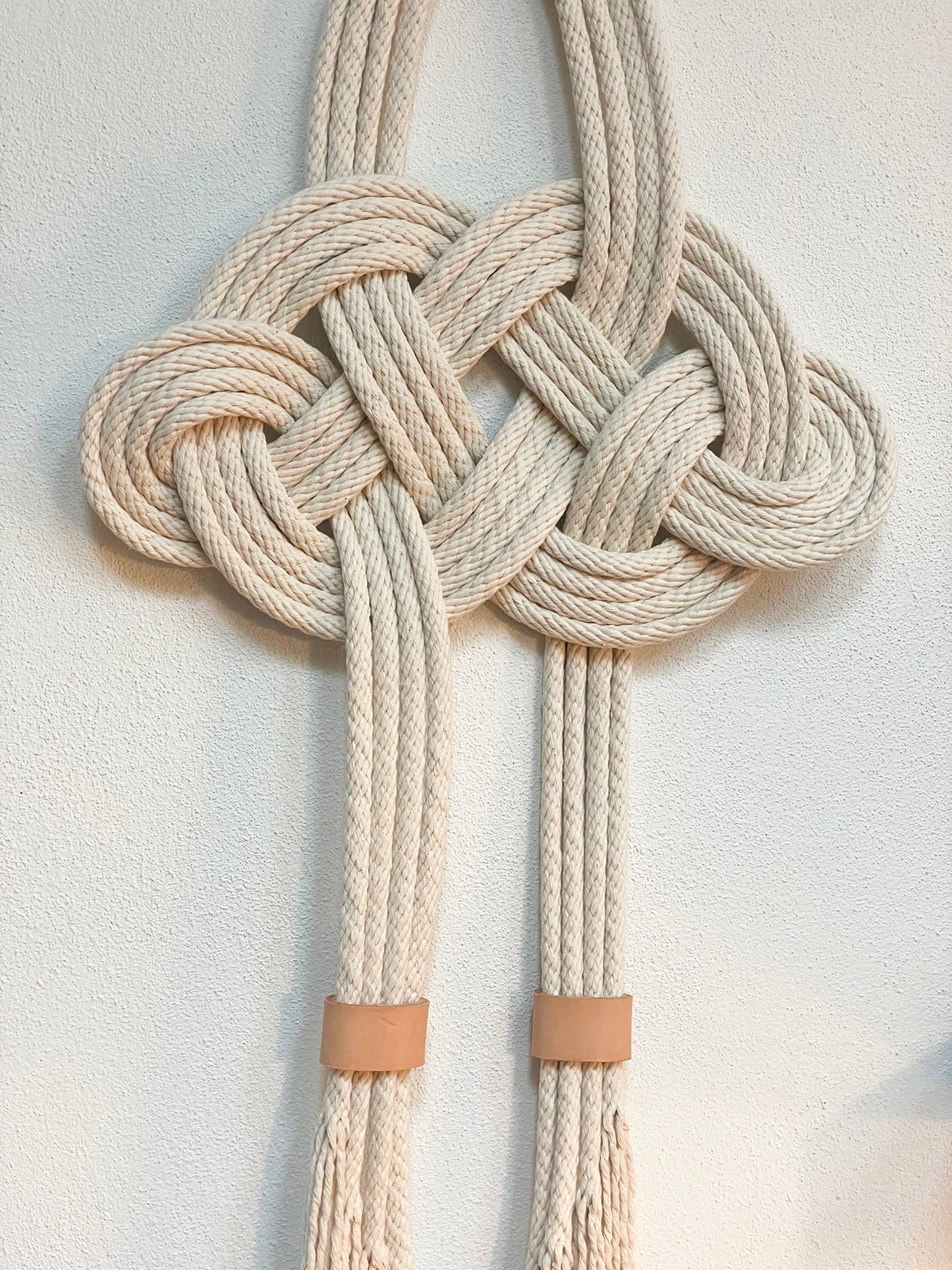 Knotted cloud wall hanging